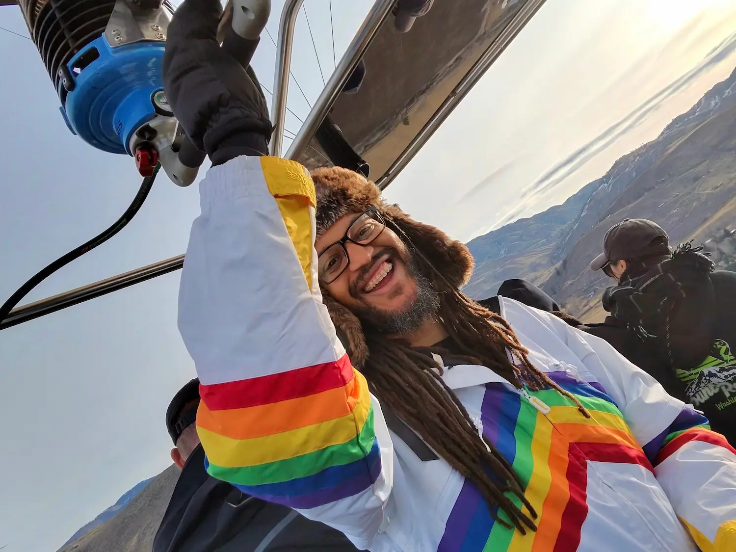 Seattle Ballooning pilot operating the burner during a hot air balloon ride at the Winthrop Balloon Festival